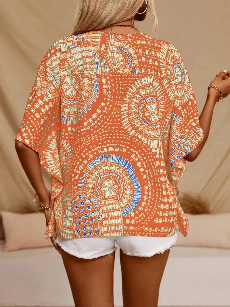 V-neck printed resort-style batsleeved top