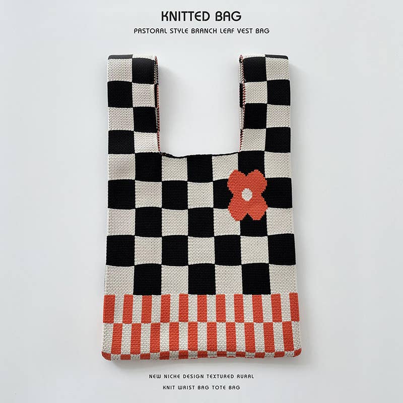Heart-shaped color-blocked knitted handbag