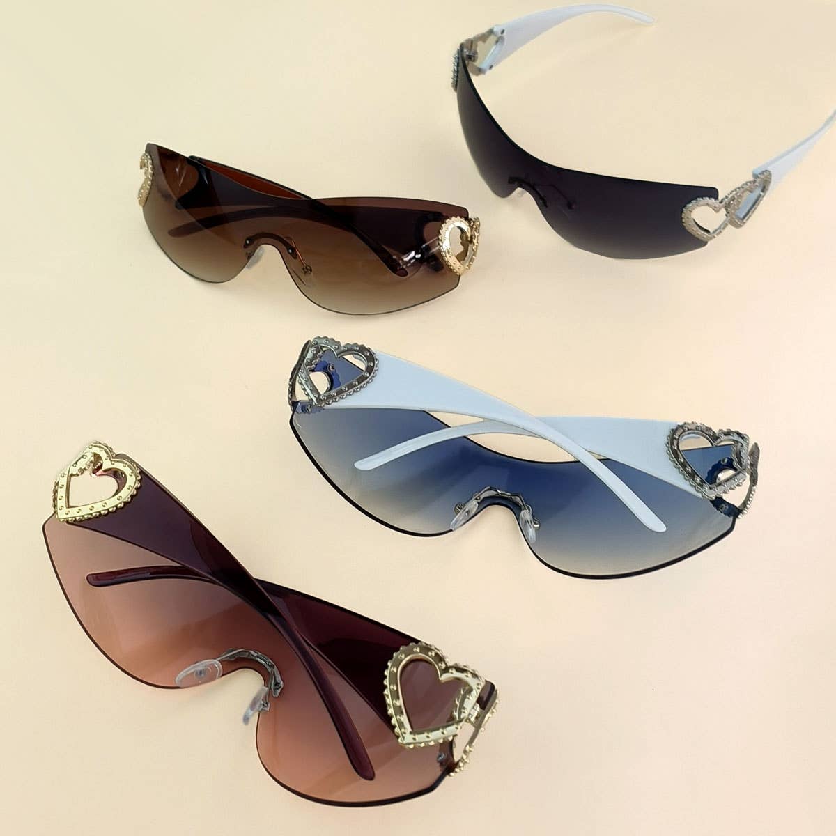 Y2K STYLE FRAMELESS ONE-PIECE HEART SUNGLASSES_CWASG0266