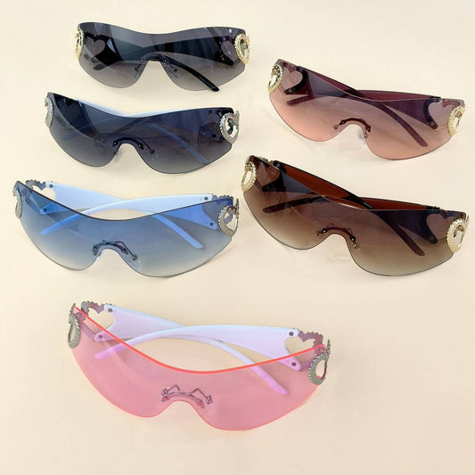 Y2K STYLE FRAMELESS ONE-PIECE HEART SUNGLASSES_CWASG0266