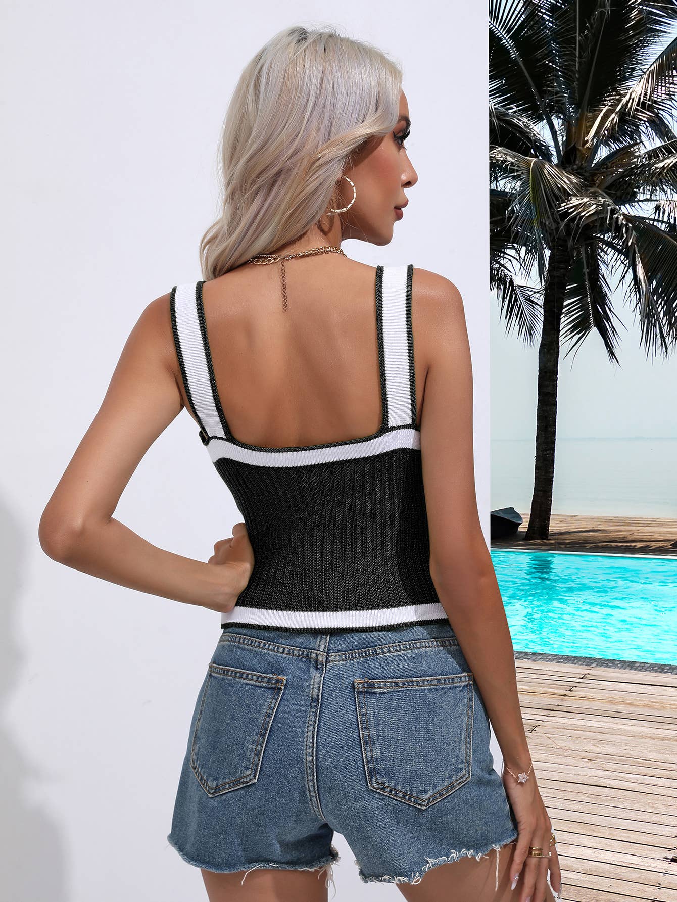 SLEEVELESS V-NECK SWEATER WITH CROSS HALTER