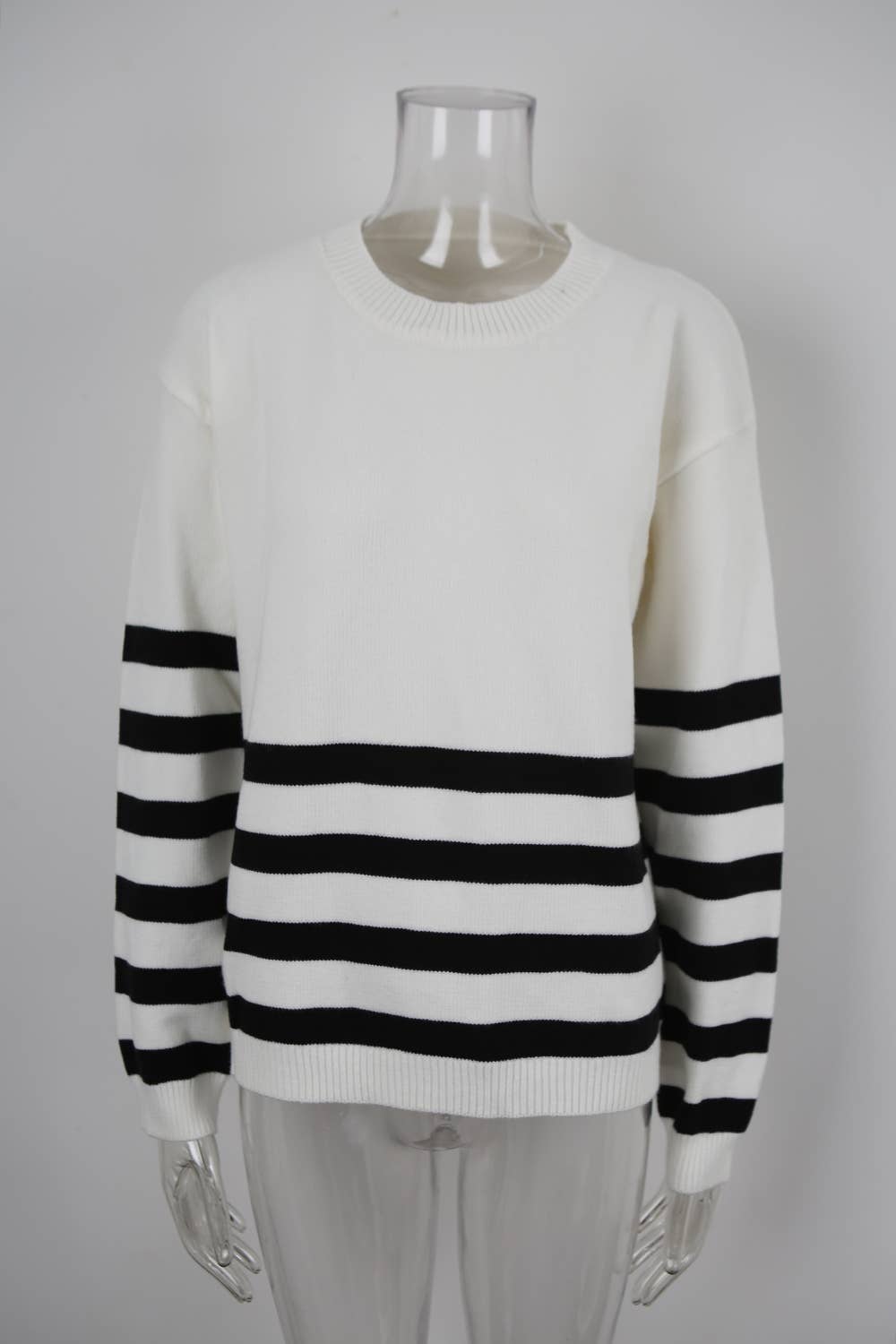 Round-neck, long-sleeved and striped sweater