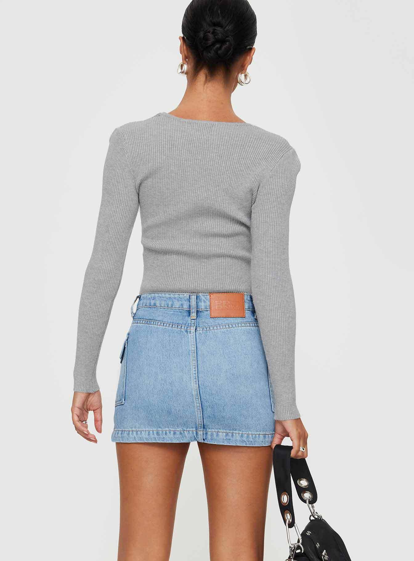 Washed denim mini skirt with elegant temperament