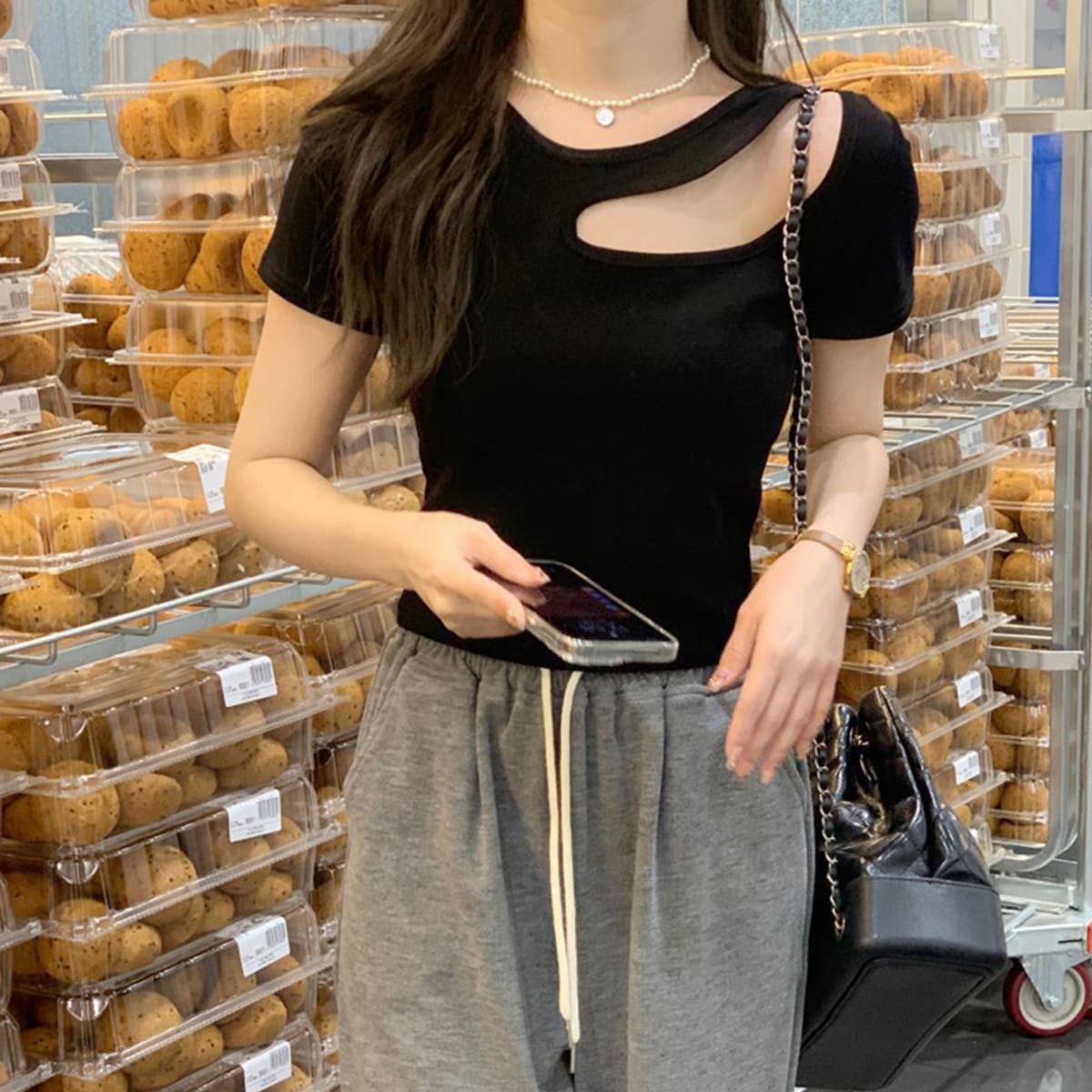 Slim-fit short-sleeved cut-out blouse