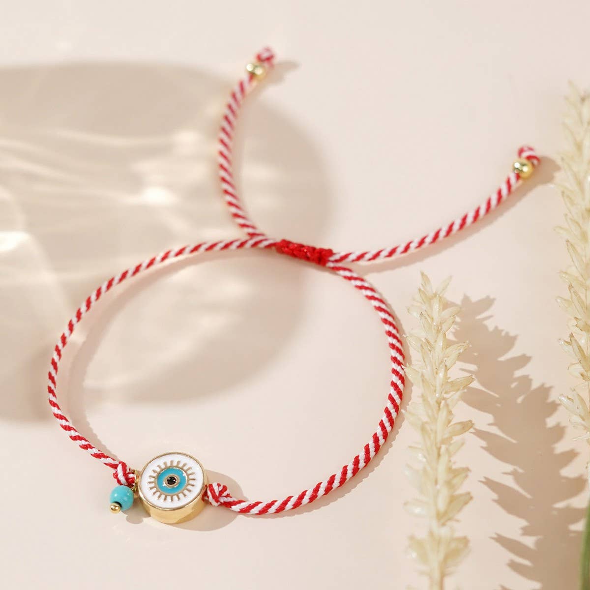 WHITE EYES TURQUOISE RED AND WHITE ROPE BRACELET