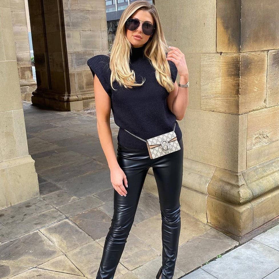 SOLID SLEEVELESS TURTLENECK SHOULDER PAD SWEATER