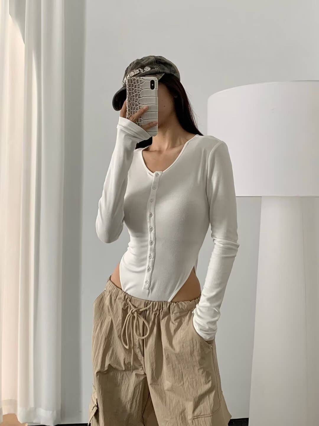 Round-neck single-breasted long-sleeved jumpsuit