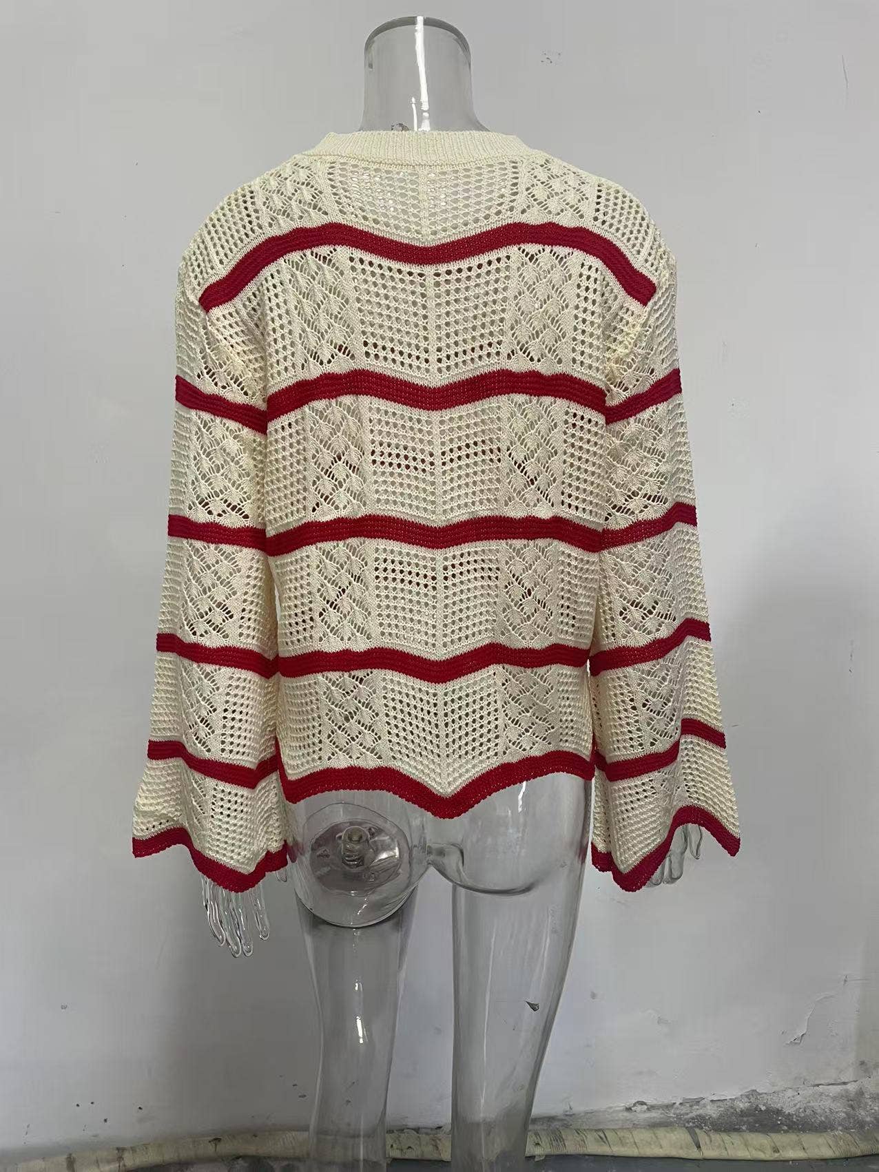 Wavy flared long-sleeved hollowed-out sweater
