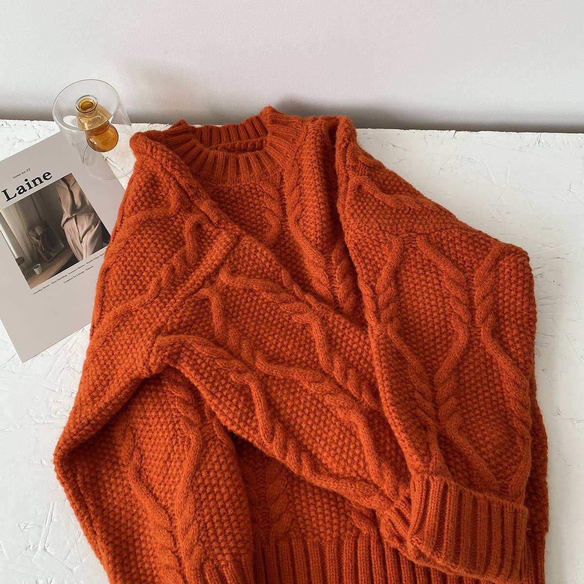 Twist loose solid color crew neck pullover sweater