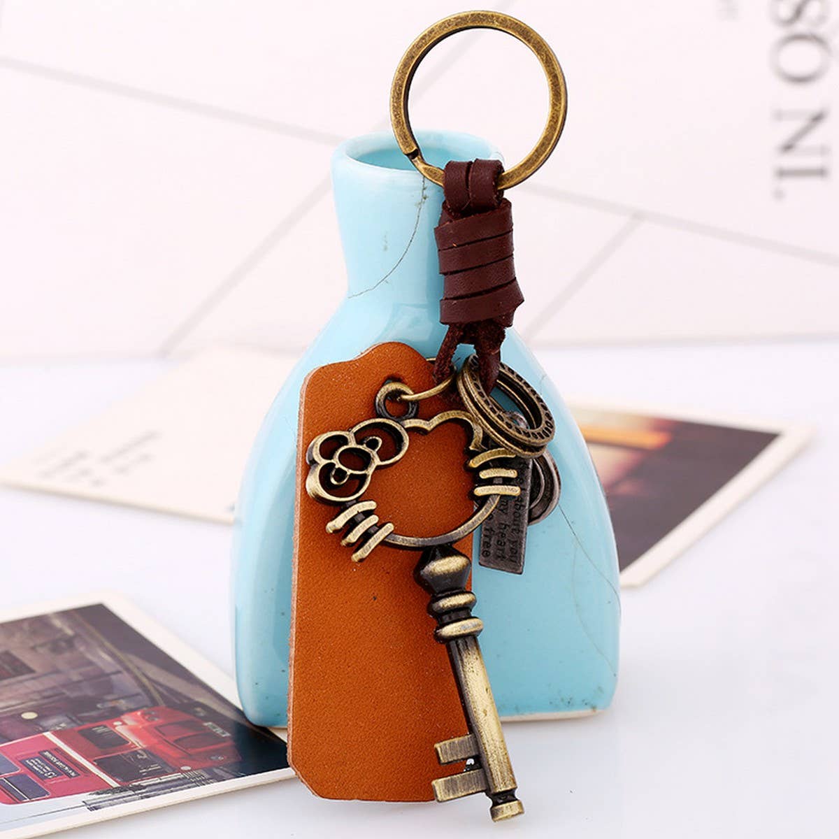 VINTAGE WOVEN CREATIVE PENDANT COWHIDE KEYCHAIN