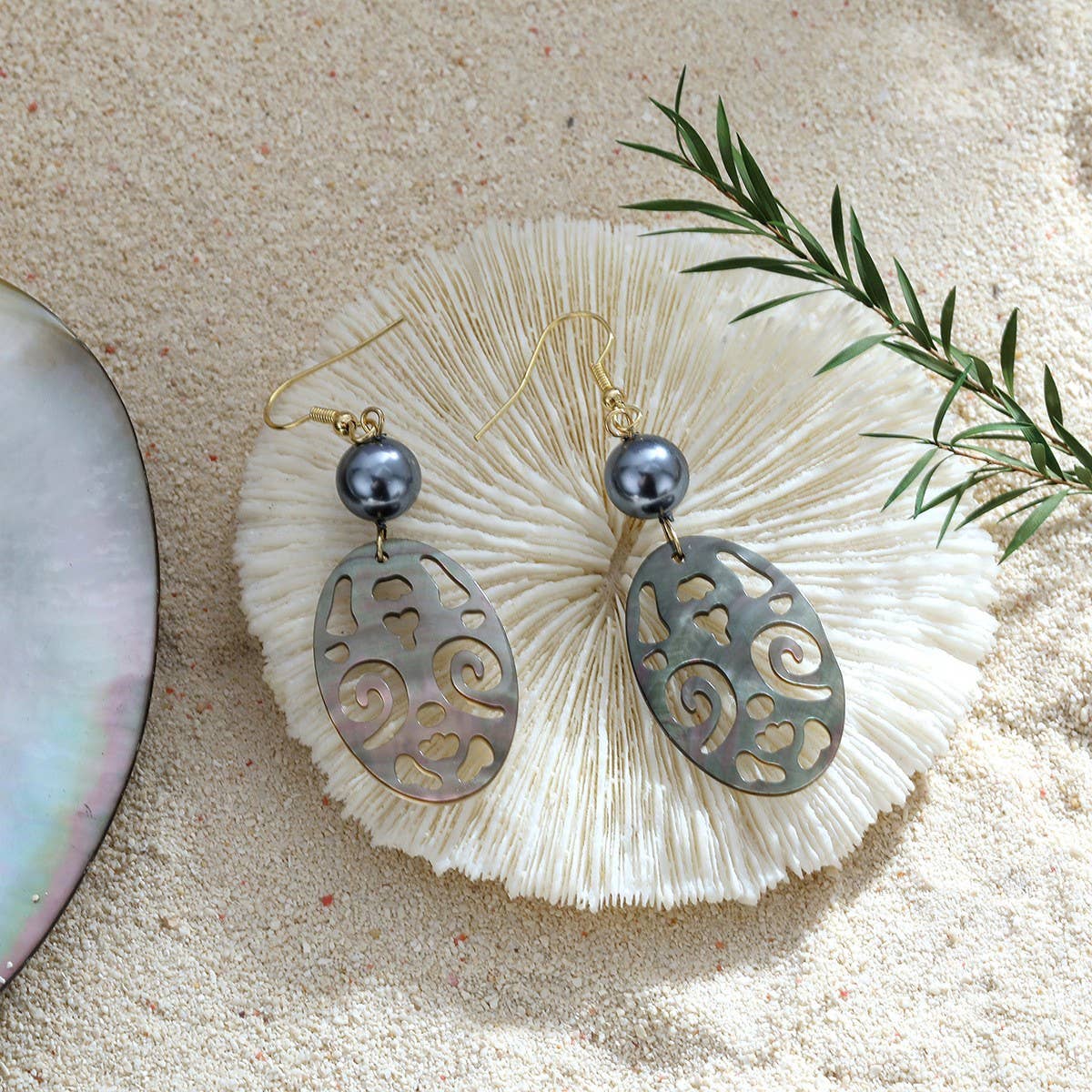 CREATIVE HOLLOW CARVED NATURAL SHELL EARRINGS