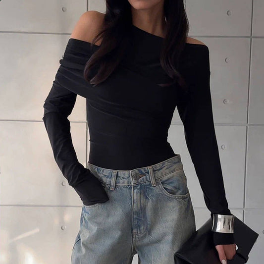 A solid-color fitted knitted top