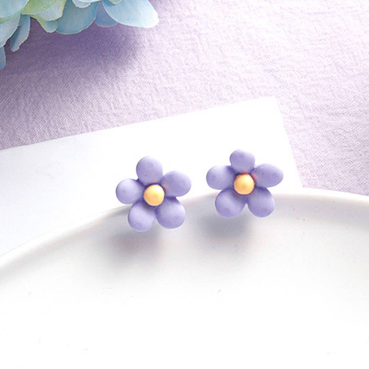 Purple simple and fresh floral stud earrings