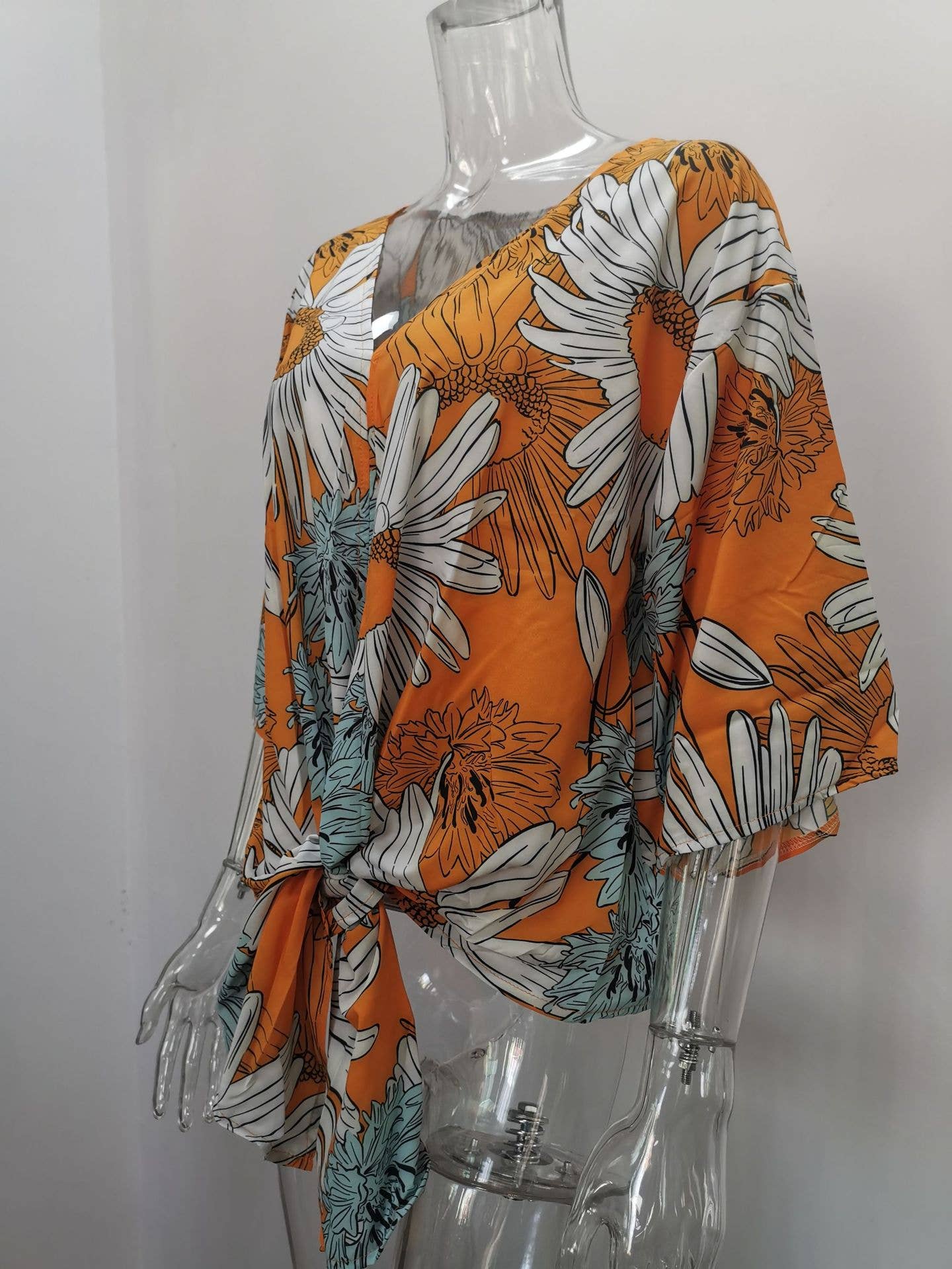 V-neck knotted printed loose sleeved top