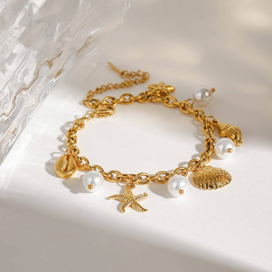 18K Gold Sea Charm Bracelet in Stainless Steel_CWAJE4641