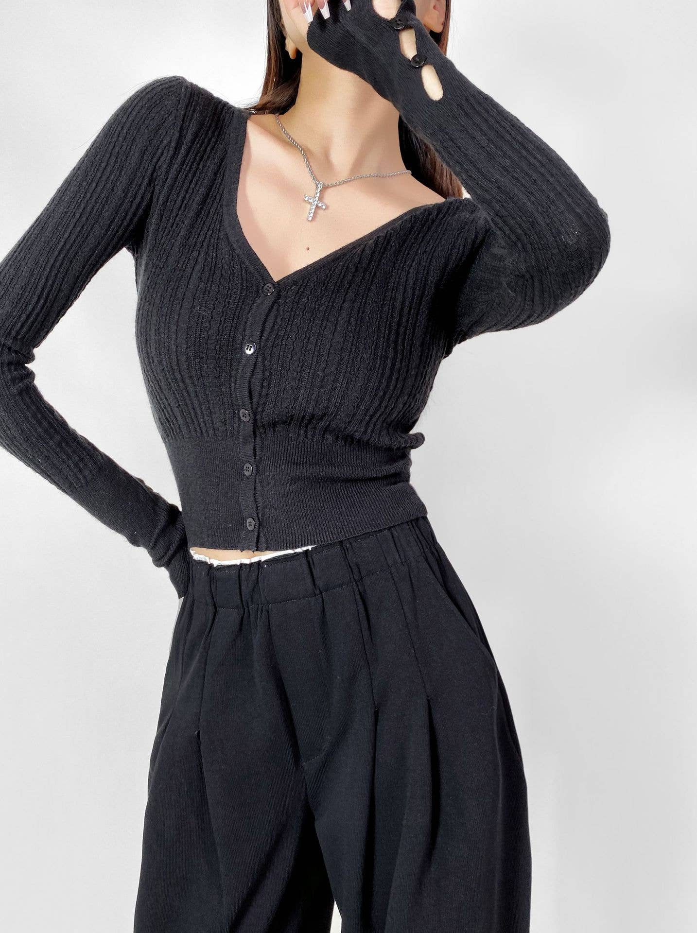 Solid-color V-neck long-sleeved knitted sweater