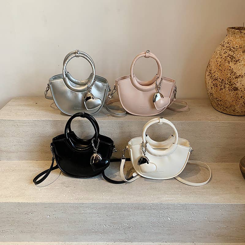 Fashionable and versatile hand-held crossbody bag