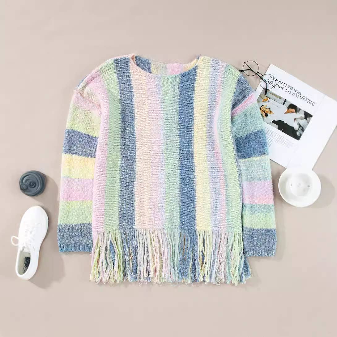 Stylish lady with fringe patchwork sweater