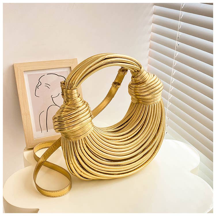 Metallic color striped appearance glossy handbag