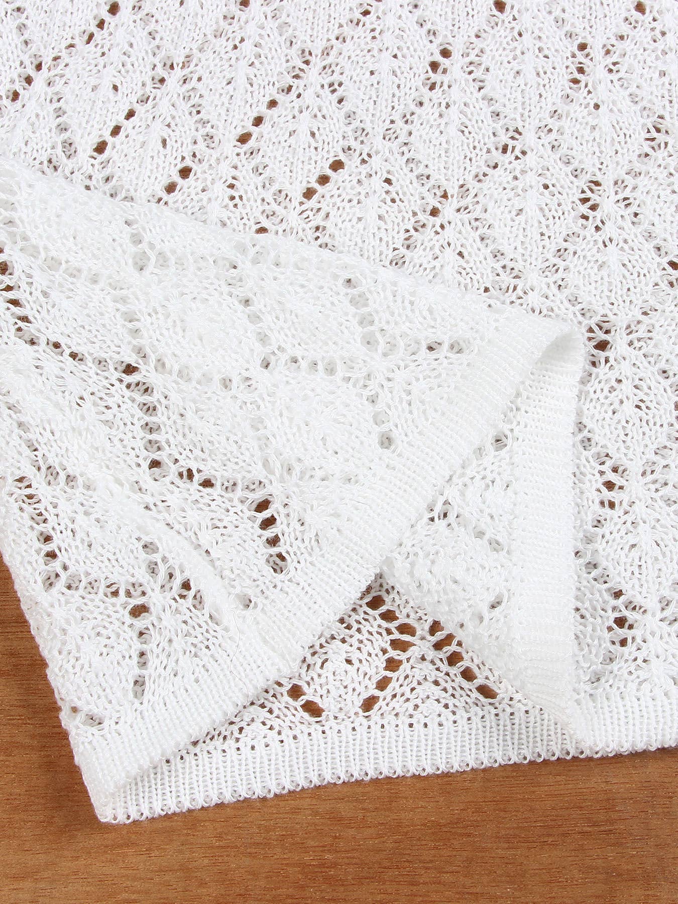 Hollowed-out hip-hugging knitted dress