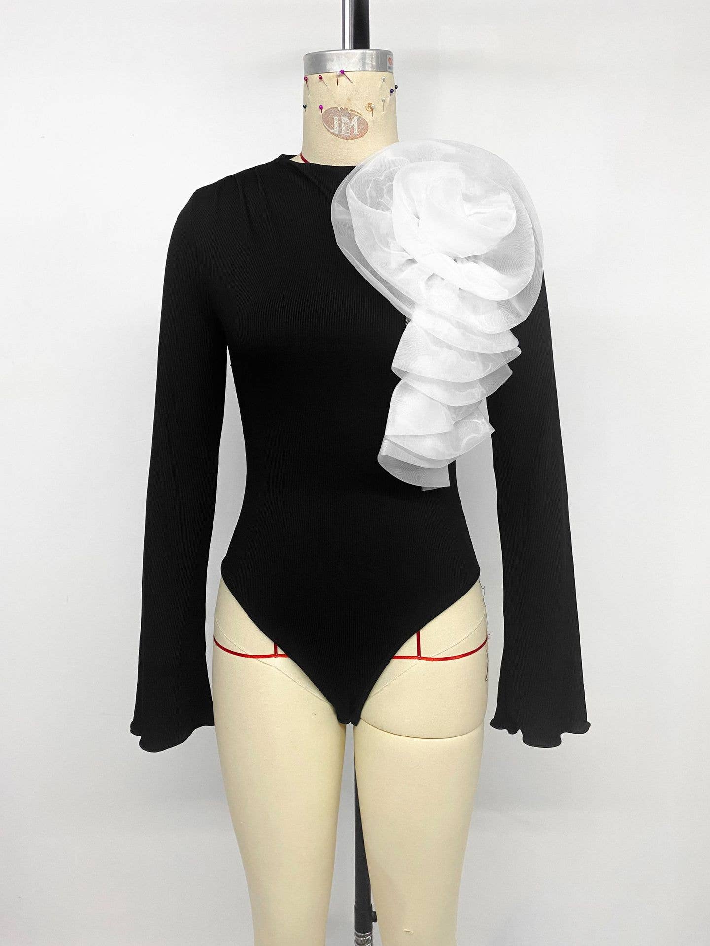 Three-dimensional floral long-sleeved jumpsuit