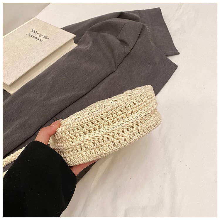 Fashionable hollowed-out woven crossbody bag