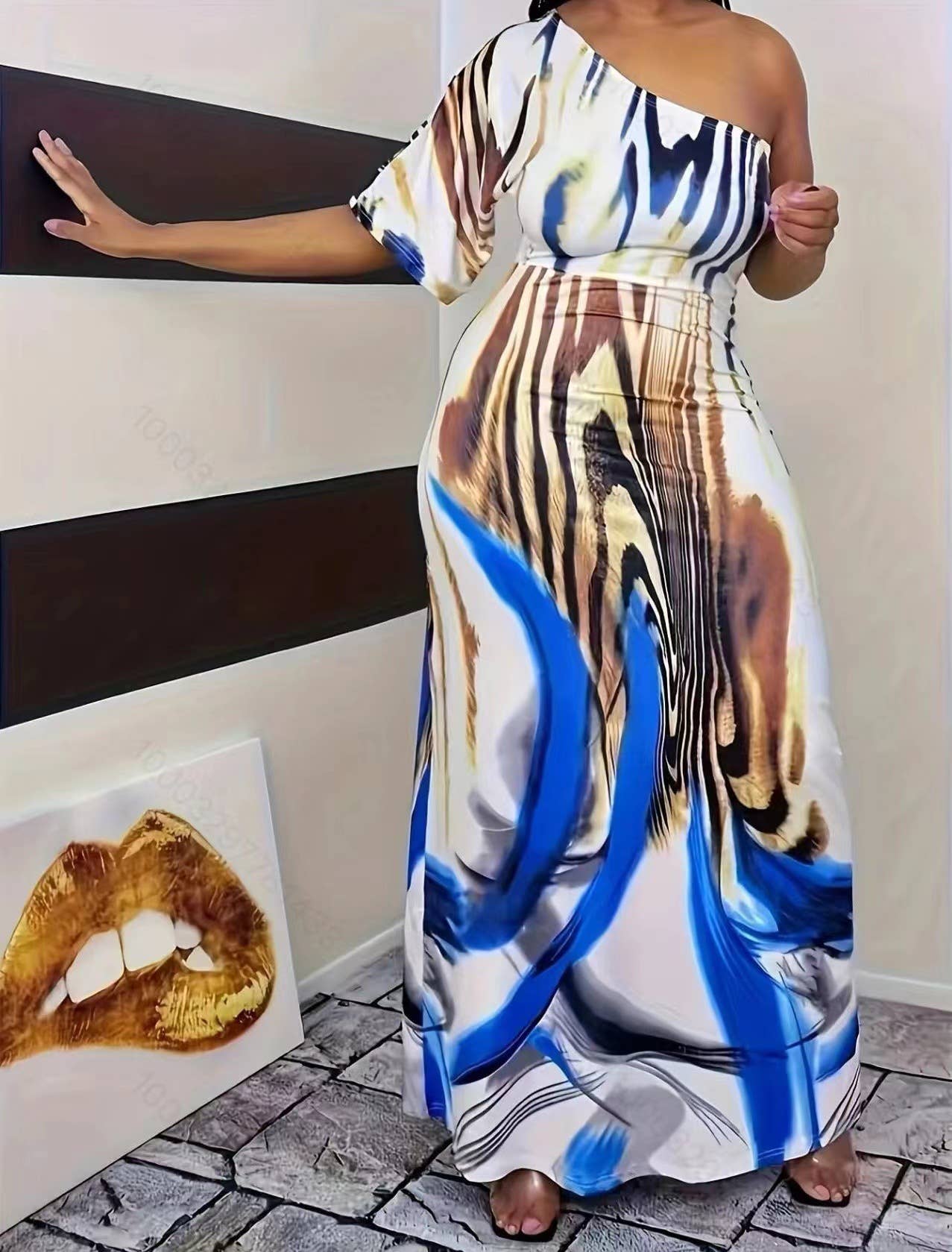 PRINTED ONE-SLEEVED DRESS WITH SLOPING SHOULDERS