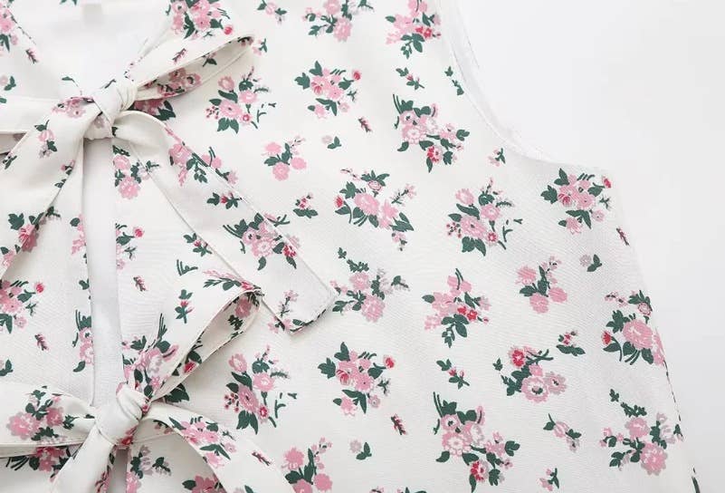 SHORT FLORAL PRINT STRAP VEST