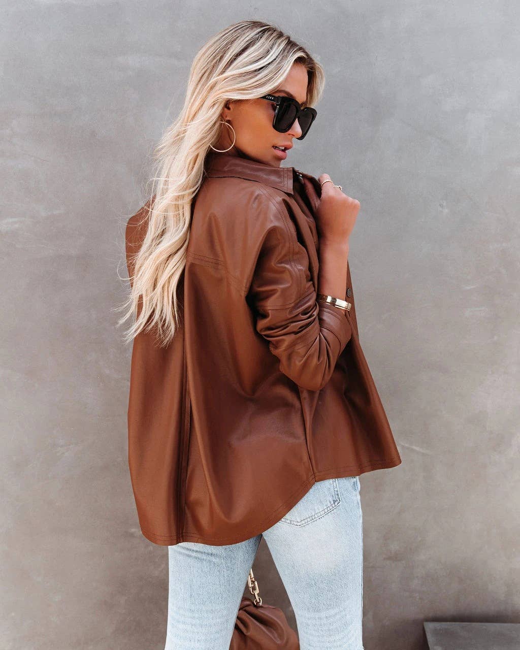 Lapel solid-color long-sleeved leather jacket