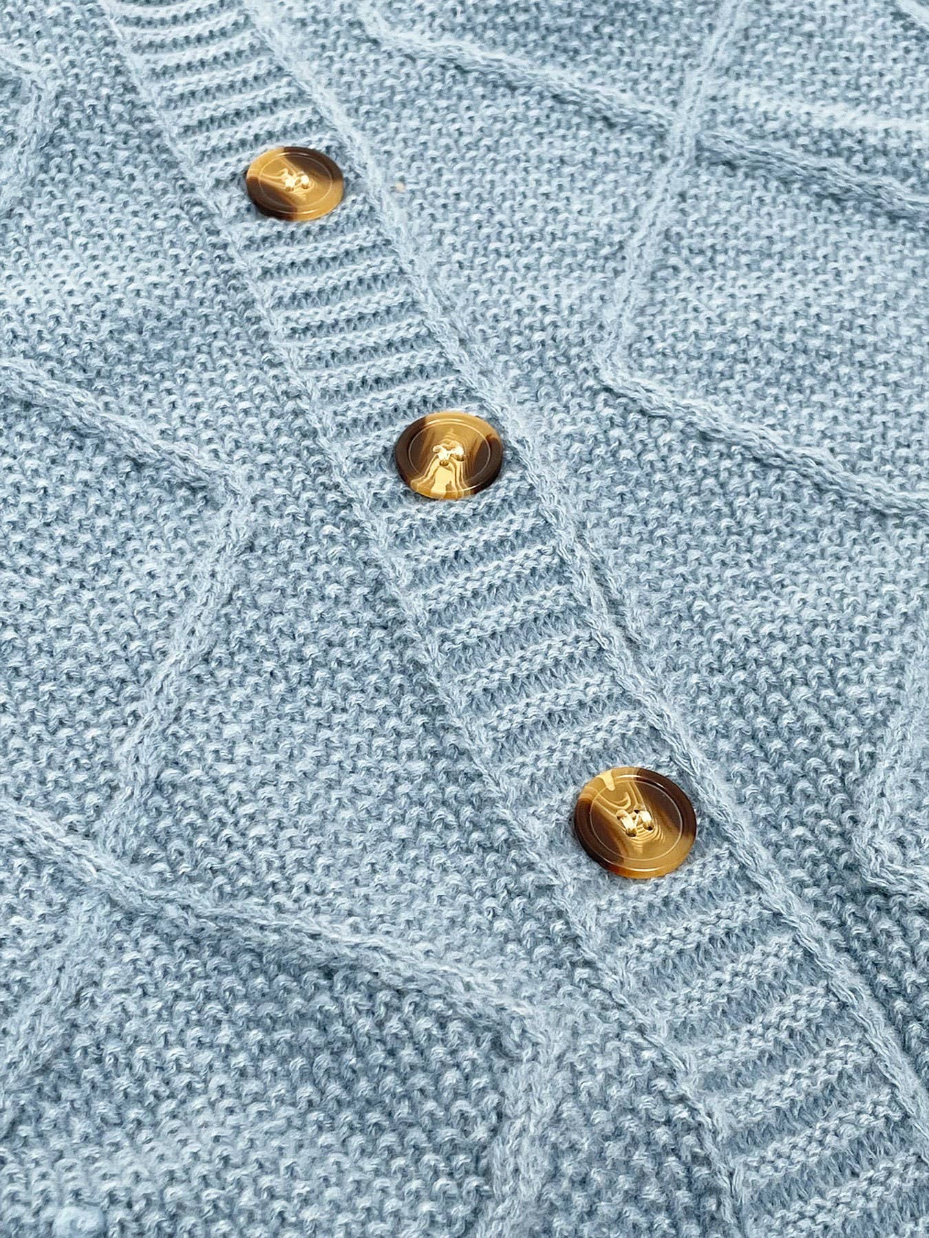 Solid-color diamond-check loose knitted cardigan