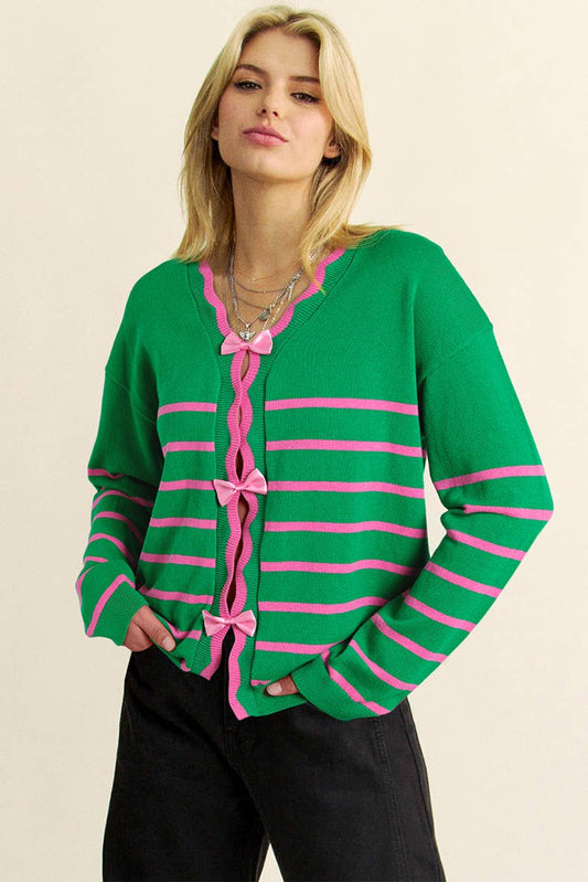 STYLISH AND PLAYFUL AGE-REDUCING BOW SWEATER