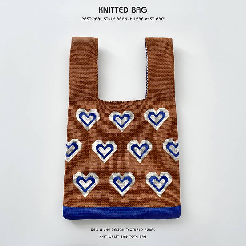 Heart-shaped color-blocked knitted handbag