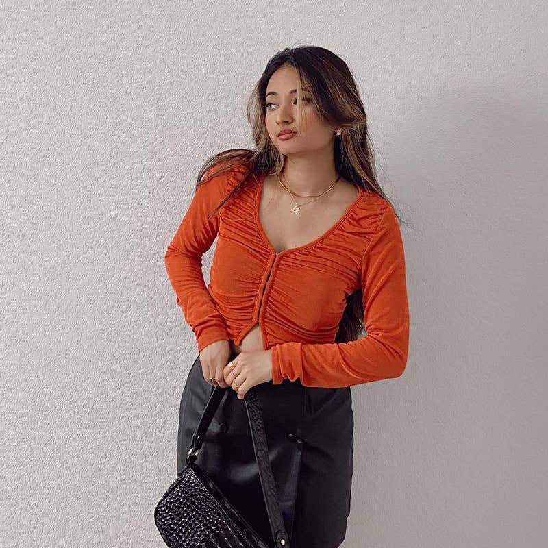 V-neck solid color pleated hidden button top