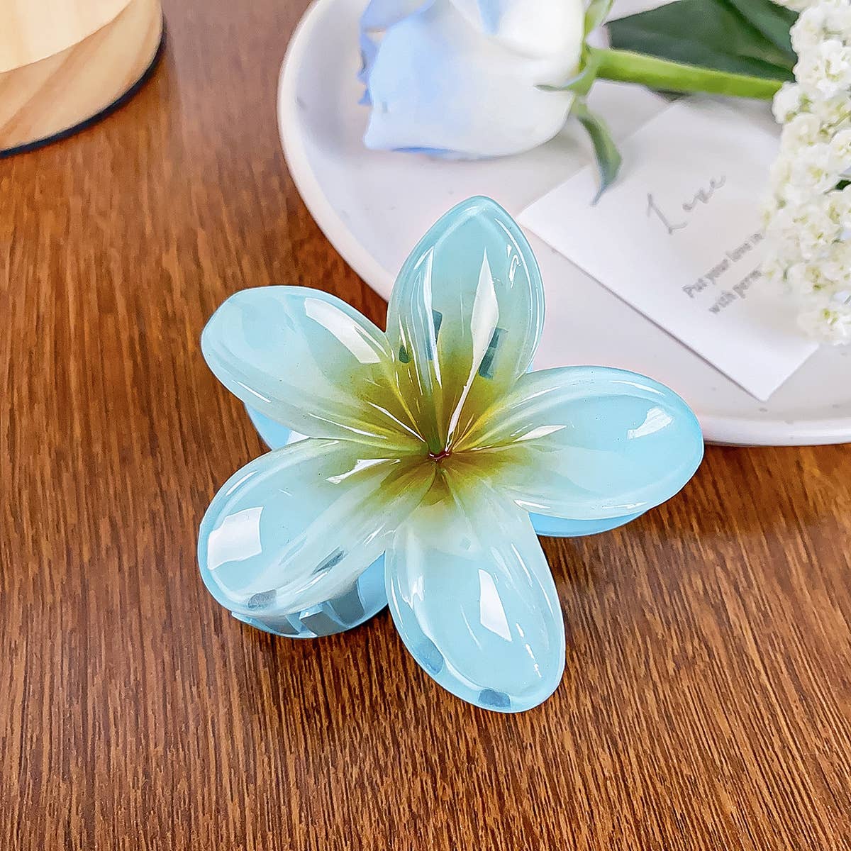 Frangipani hand-held vintage flower hair clips