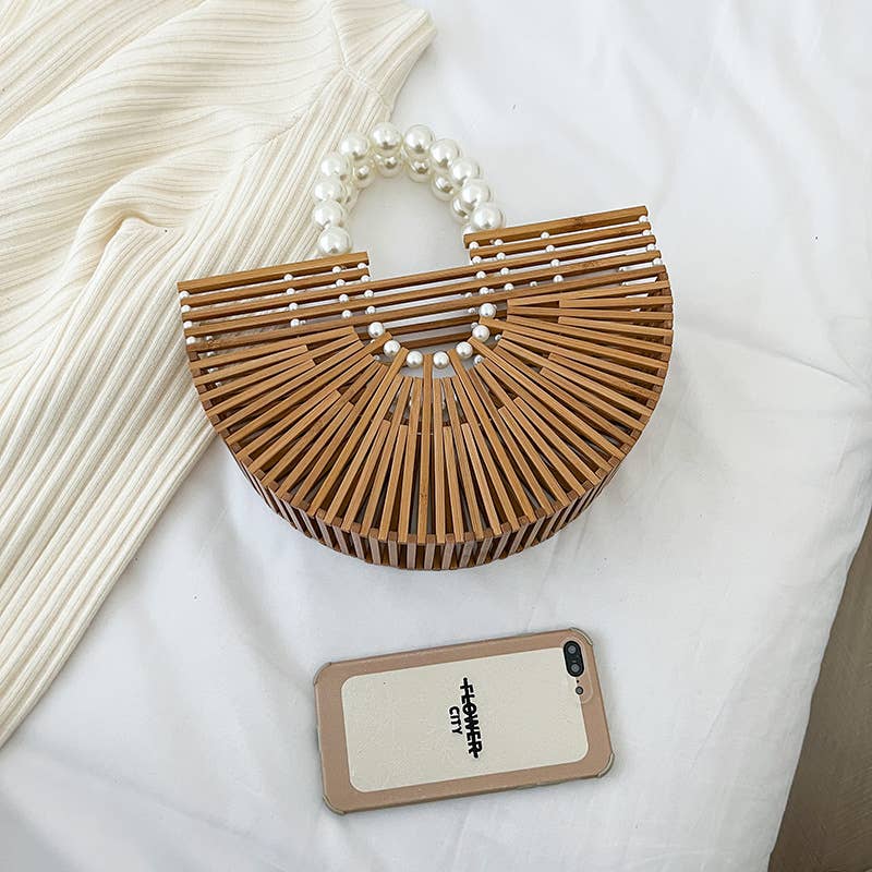 Weave fashionable hollowed-out pearl handbags