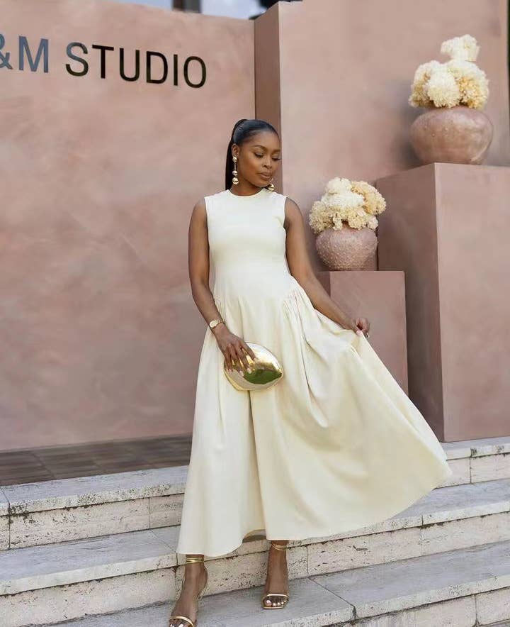 Sleeveless solid-color vest dress with large hem