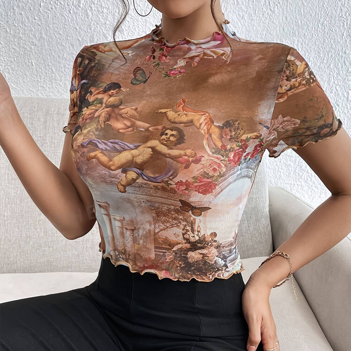 FLORAL PRINT MESH TOP WITH RUFFLE DETAILING
