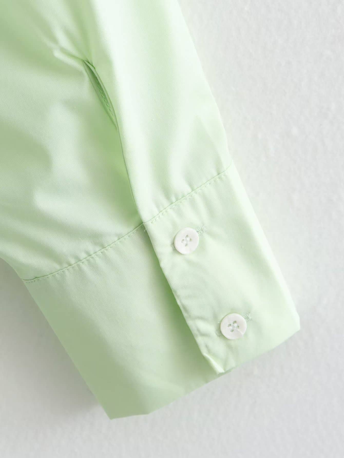 Side-drawstring long-sleeved solid-color shirt