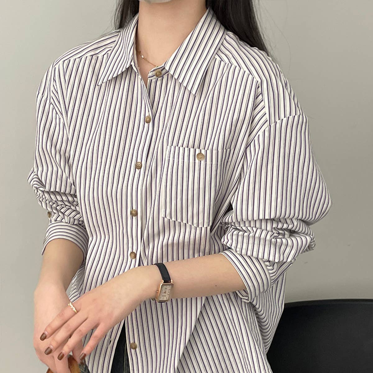 Wear a wide, slim, long-sleeved shirt