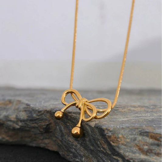 FASHIONABLE GOLDEN BOW NECKLACE FOR WOMEN