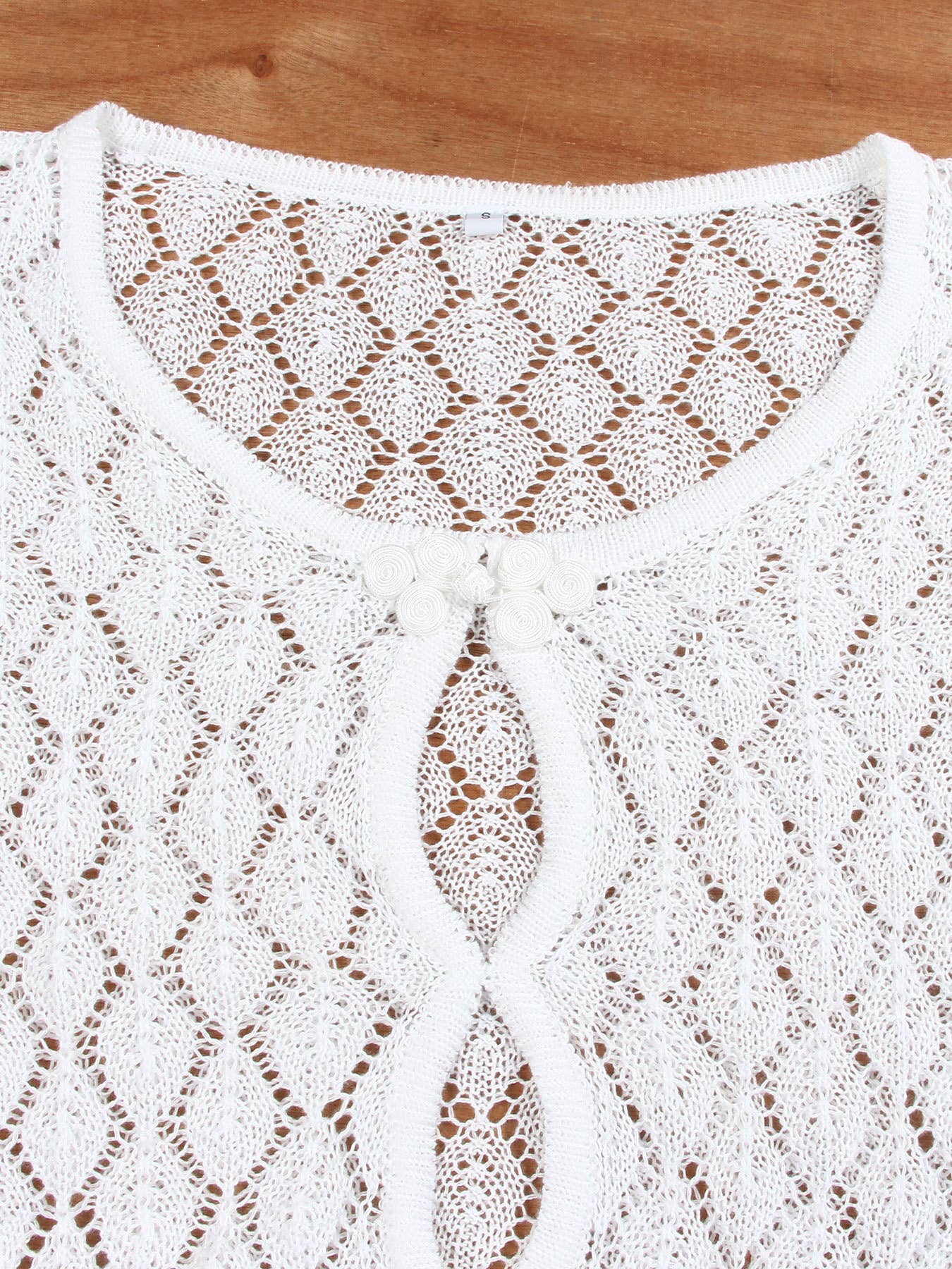 Hollowed-out hip-hugging knitted dress