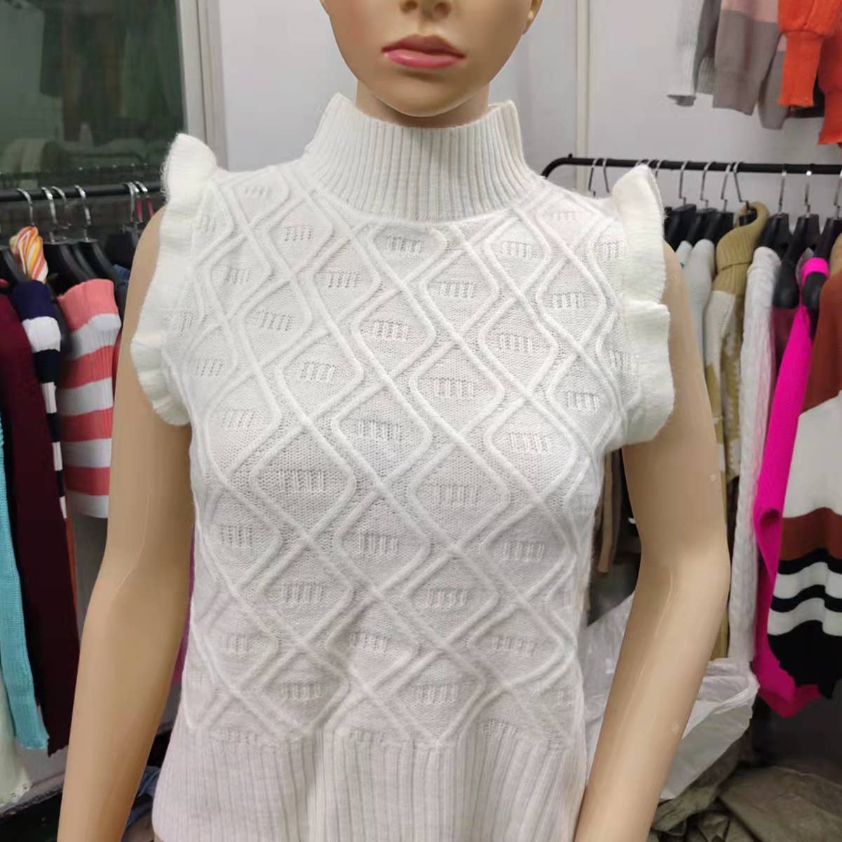 SLEEVELESS SOLID SWEATER WITH LOOSE TEMPERAMENT