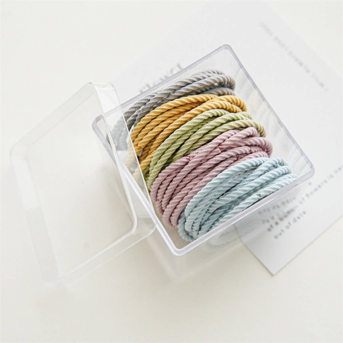 A BOX OF 50 SIMPLE AND DURABLE HAIR TIES_CWAHA1128