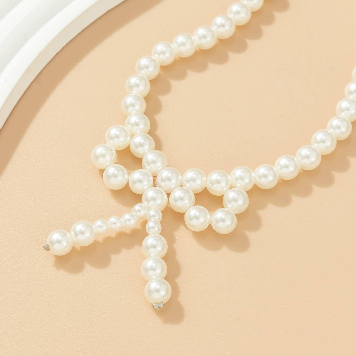 IMITATION PEARL BEADED NECKLACE WITH PEARL BOW