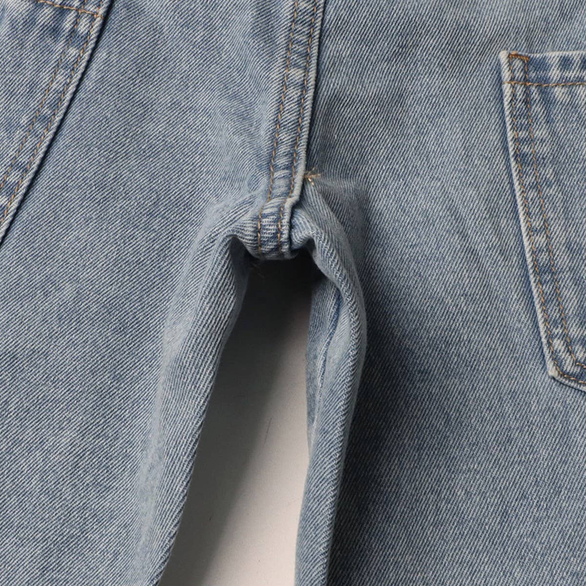 HIGH WAISTED HOLLOW EXPOSED WAIST SOLID COLOR JEANS