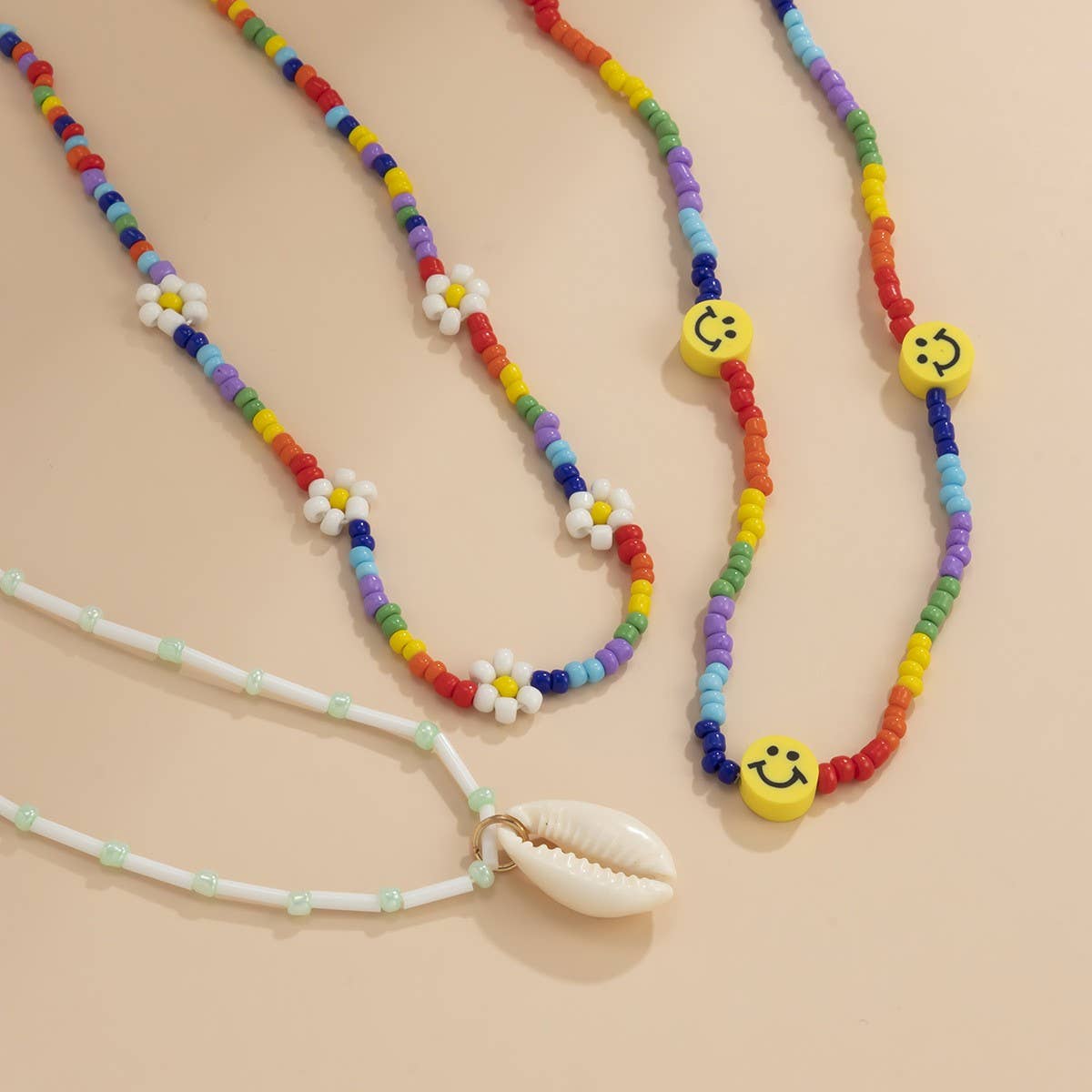 SHELL SMILEY DAISY BRAIDED NECKLACE
