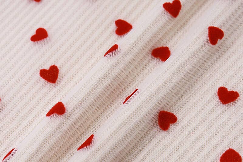 A bow-tied one-shoulder short strapless vest