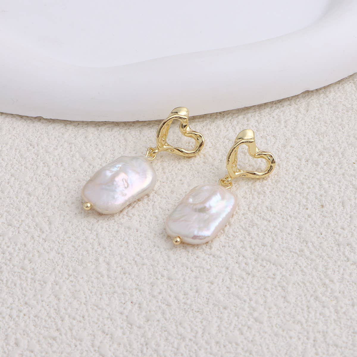 Trendy metal bow freshwater pearl earrings