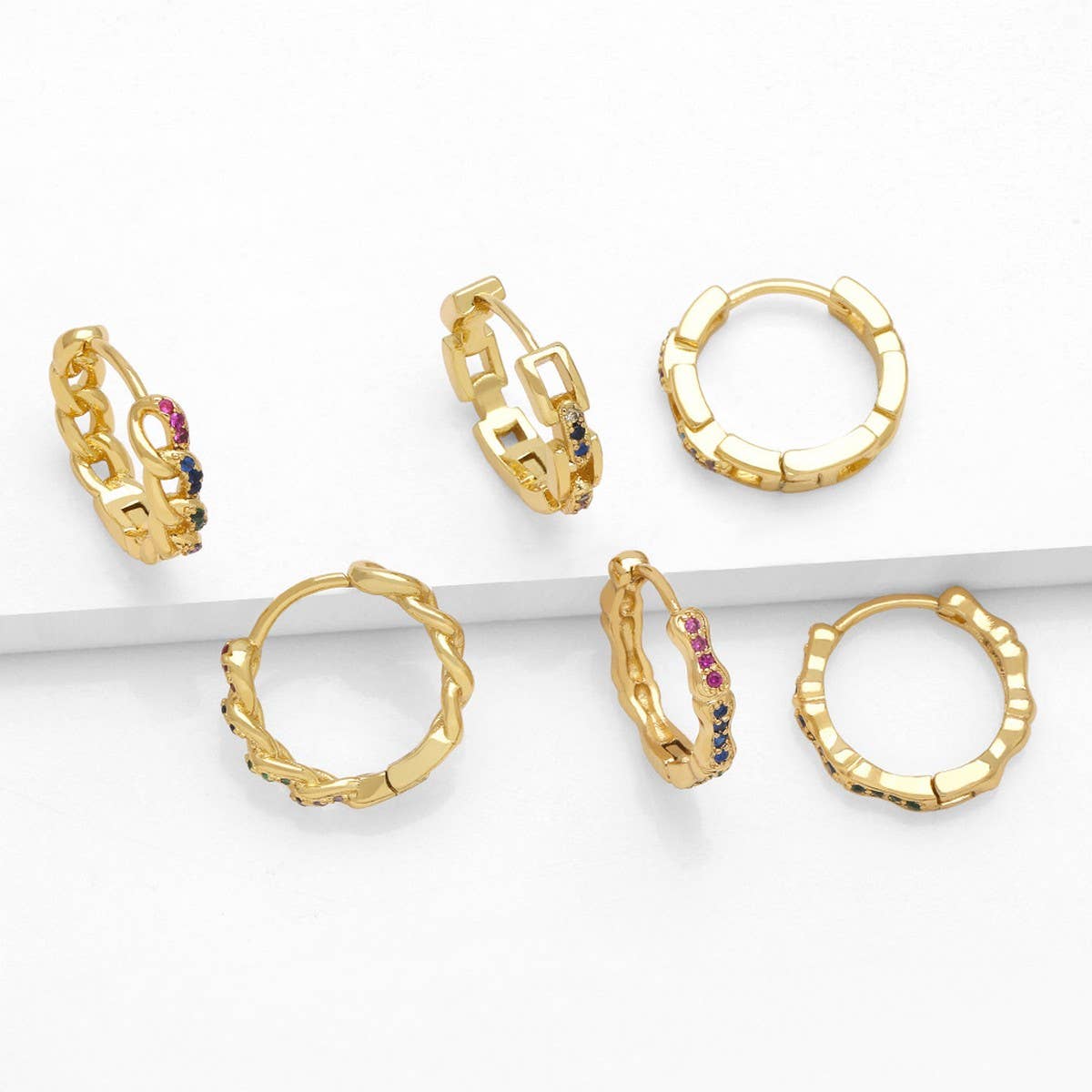 VERSATILE ROUND GOLD-PLATED EARRINGS AND STUDS