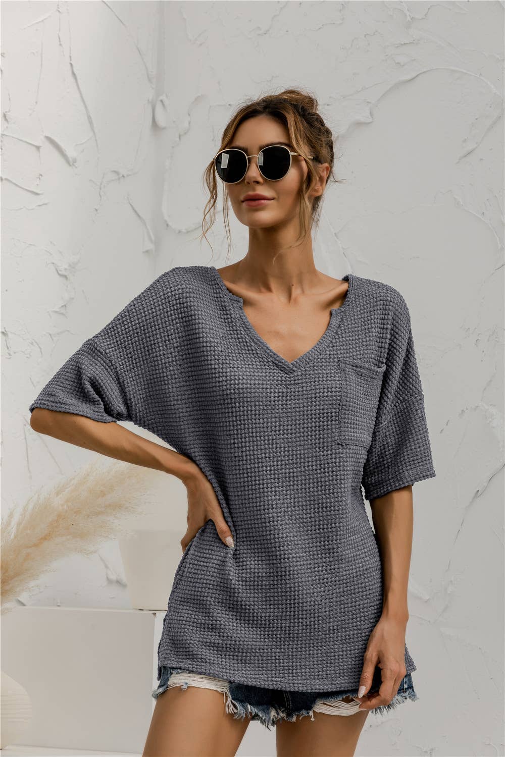 V-neck pocket slit solid-color knitted top
